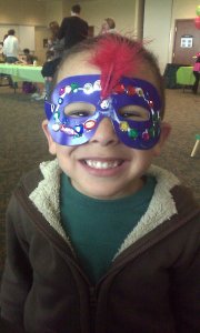boy wearing paper mask