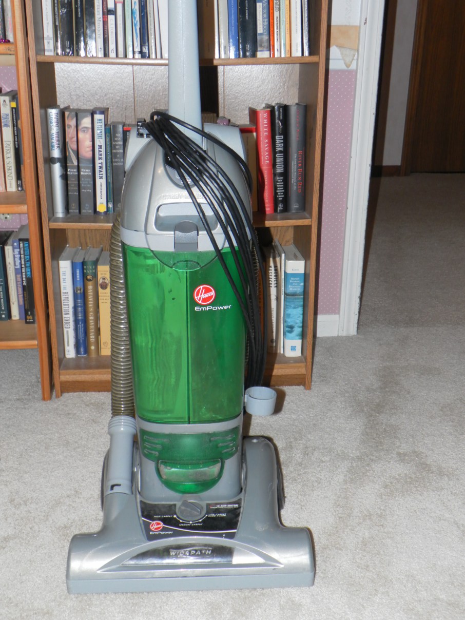 vacuum wears his cord like a bandolier