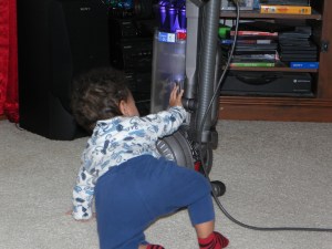 boy with vacuum attachments