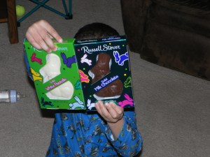 boy with chocolate bunnies