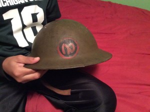 The last thing a kid's going to want on his head for an hour, and an awkward candy carrier at best.