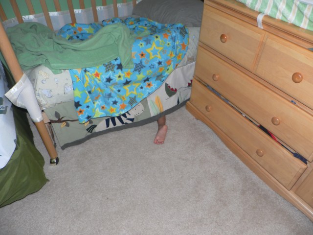 Upon closer inspection . . . If not for that protruding foot, he would have only been discovered by the K-9 Unit.